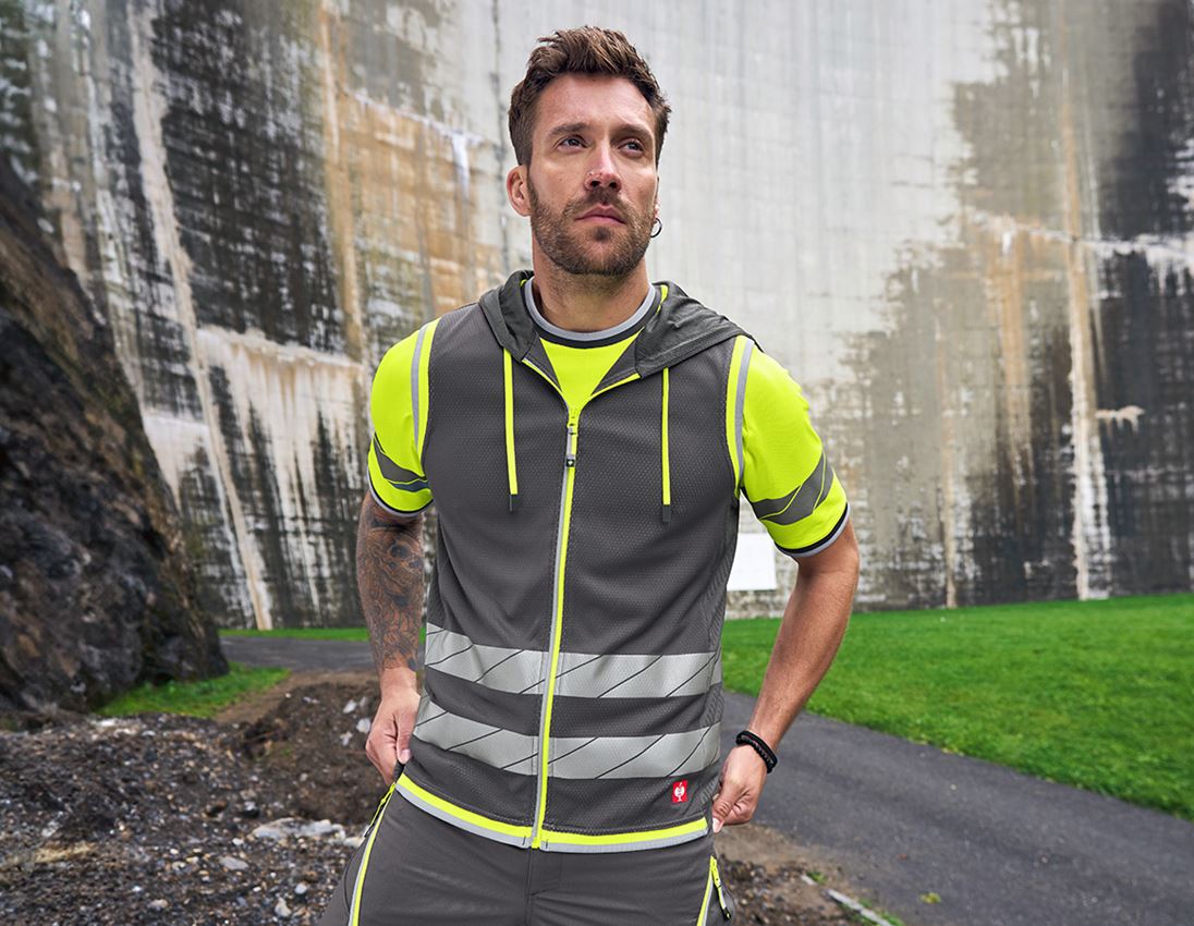 Topics: Reflex functional bodywarmer e.s.ambition + anthracite/high-vis yellow